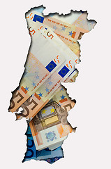 Image showing Outline map of Portugal with euro banknotes in background 