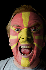 Image showing Face of crazy angry man painted in colors of macedonia flag