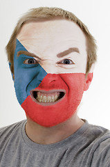 Image showing Face of crazy angry man painted in colors of czech flag