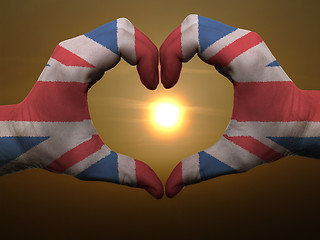 Image showing Heart and love gesture by hands colored in uk flag during beauti