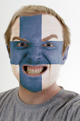 Image showing Face of crazy angry man painted in colors of finland flag