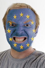 Image showing Face of crazy angry man painted in colors of europe flag