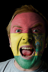 Image showing Face of crazy angry man painted in colors of Bolivia flag