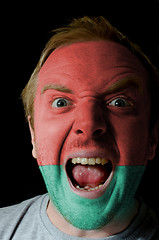 Image showing Face of crazy angry man painted in colors of belarus flag