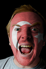 Image showing Face of crazy angry man painted in colors of turkey flag