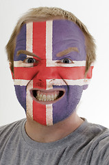 Image showing Face of crazy angry man painted in colors of iceland flag