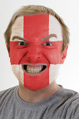 Image showing Face of crazy angry man painted in colors of england flag