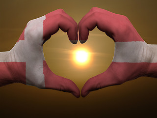 Image showing Heart and love gesture by hands colored in denmark flag during b