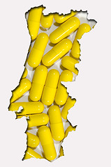 Image showing Outline map of Portugal with pills in background