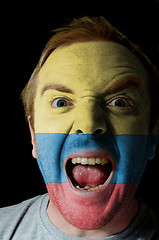 Image showing Face of crazy angry man painted in colors of Columbia flag