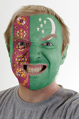 Image showing Face of crazy angry man painted in colors of Turkmenistan flag