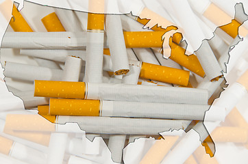 Image showing Map of USA with cigarettes in background