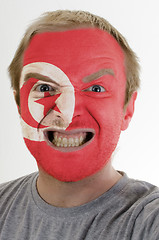 Image showing Face of crazy angry man painted in colors of Tunisia flag