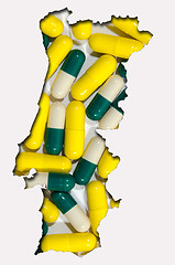 Image showing Outline map of Portugal with pills in background