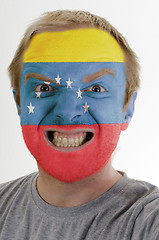 Image showing Face of crazy angry man painted in colors of venezuela flag