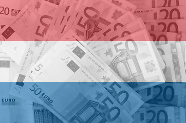 Image showing flag of Netherlandswith transparent euro banknote s in backgroun