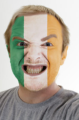 Image showing Face of crazy angry man painted in colors of ireland flag