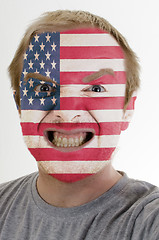 Image showing Face of crazy angry man painted in colors of usa flag