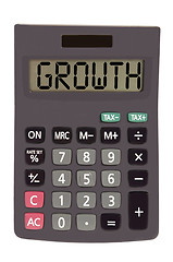 Image showing Old calculator on white background showing text 