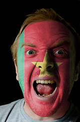 Image showing Face of crazy angry man painted in colors of Cameroon flag