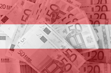 Image showing flag of Austria with transparent euro banknotes in background 