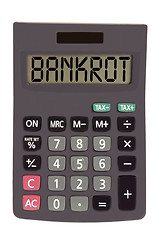 Image showing Old calculator on white background showing text 