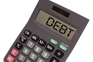 Image showing Old calculator on white background showing text 