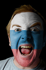 Image showing Face of crazy angry man painted in colors of russia flag