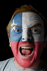 Image showing Face of crazy angry man painted in colors of Chile flag