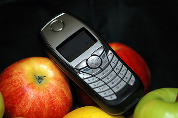 Image showing Phone and fruit