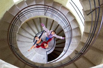 Image showing beautiful young girl with mother on staircase