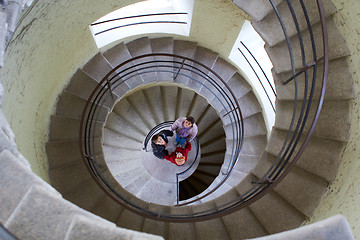 Image showing beautiful young girl with mother on staircase