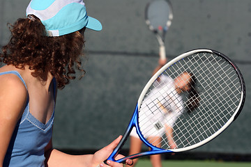 Image showing Two girls playing tennis