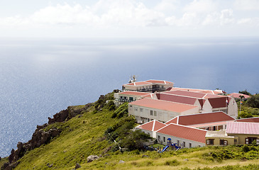 Image showing  village typical architecture on cliff over Caribbean Sea on 