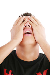 Image showing desperate teenage boy on white background 