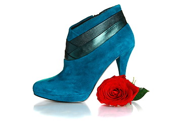 Image showing Beautiful female shoes with high heels and flower.