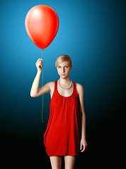 Image showing blonde in red dress with the red balloon