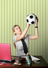 Image showing businesswoman watching soccer competitions