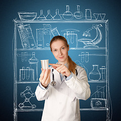 Image showing doctor woman with cup for analysis