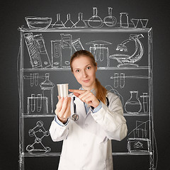 Image showing doctor woman with cup for analysis