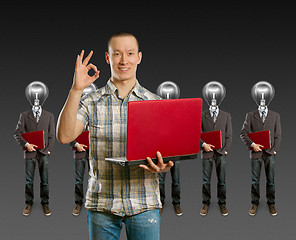 Image showing lamp head businesspeople with laptop