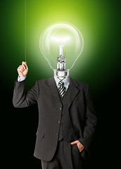 Image showing business man turn on hith bulb head