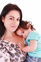 Image showing Mother holding her lovely daughter, isolated on white