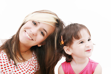 Image showing Teen sister and baby sister.  Cute sisters portrait, close up, i