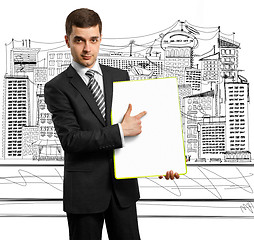 Image showing businessman with empty write board