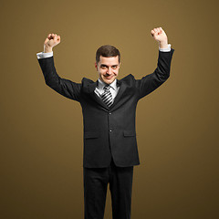 Image showing businessman with hands up