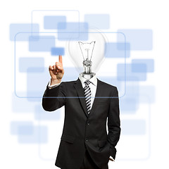 Image showing businessman with lamp-head push the button