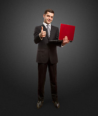 Image showing businessman with laptop shows well done