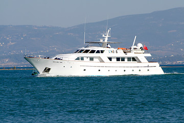 Image showing Motor boat leaving the marina