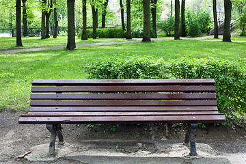 Image showing wooden bench in old park